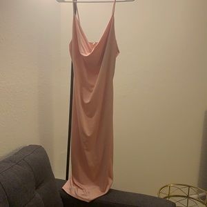 A cute cowl neck dress in a size Large with tags still on!